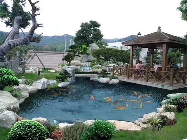 阳日镇庭院鱼池假山设计